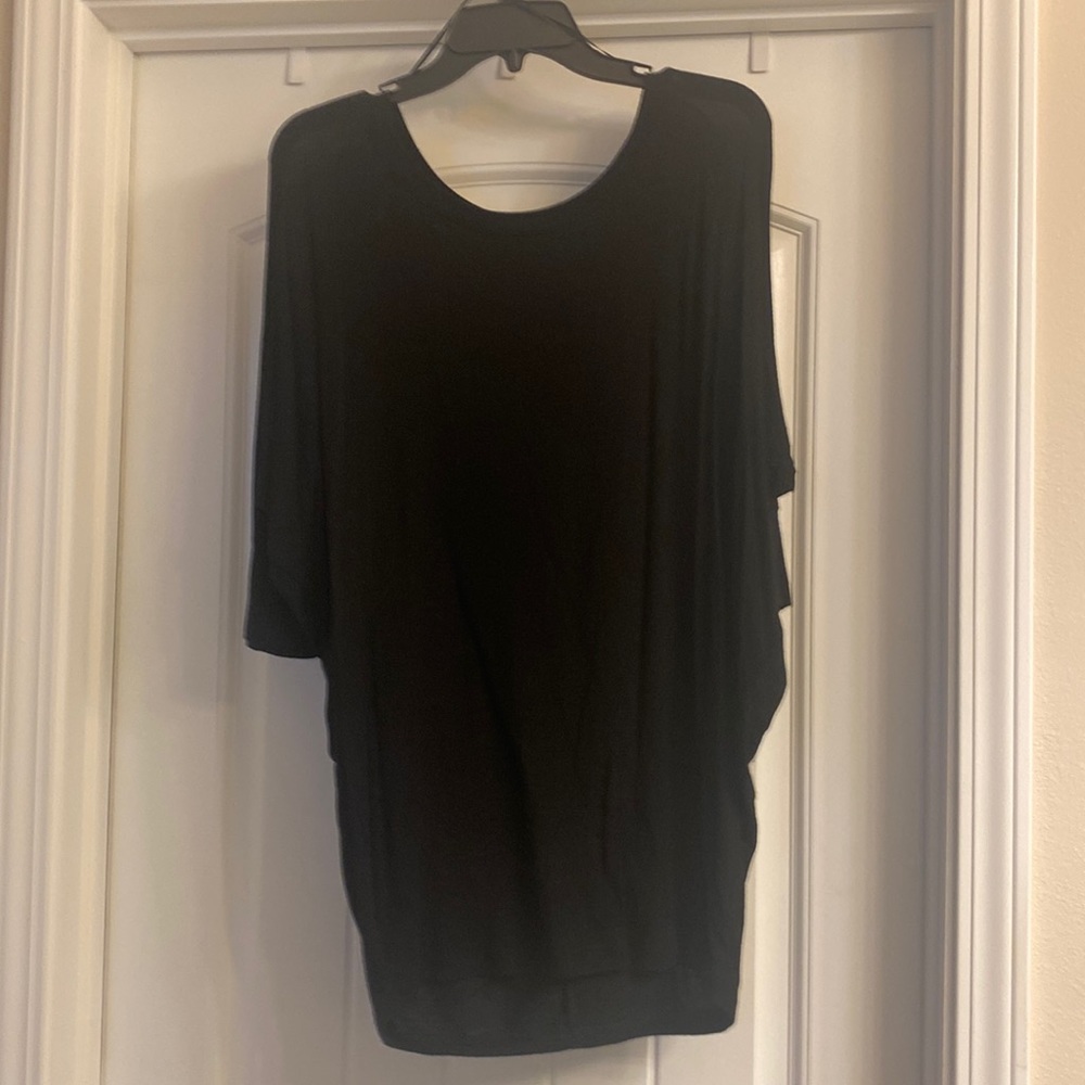 Dolman sleeve black top.